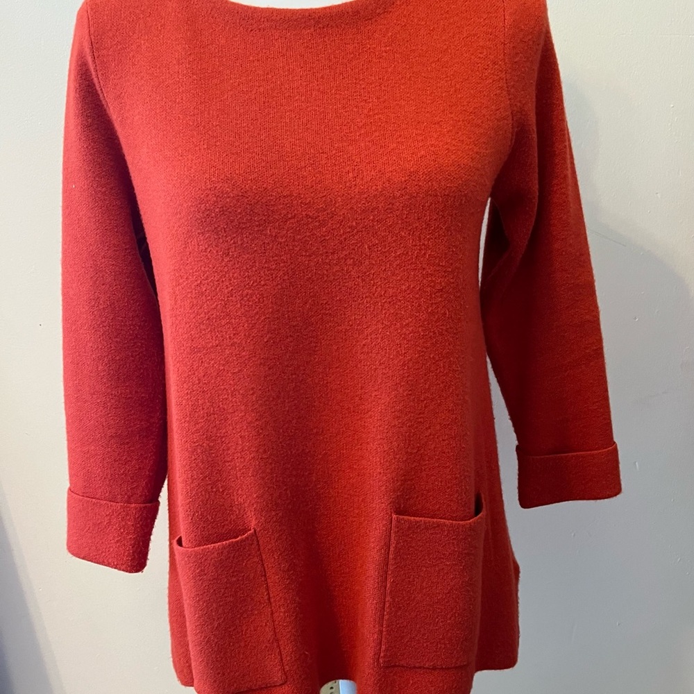 Fall weather orange brown pullover sweater with 2 front pockets zipper back-